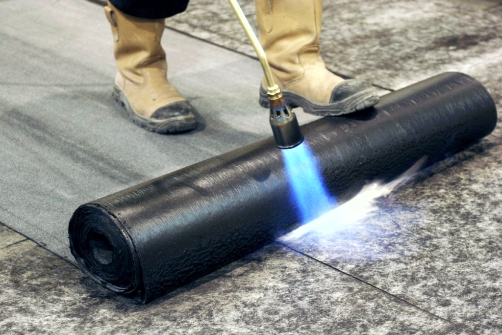 bituminous membrane waterproofing applied using torch on roof surface