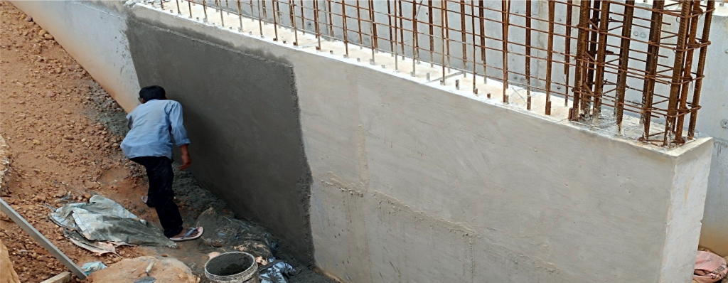 Cementitious waterproofing on basement wall to prevent water leakage and damp wall problems