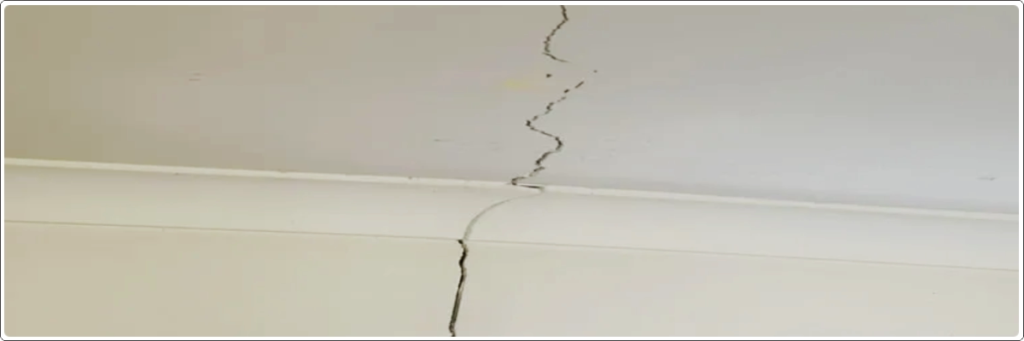cracks on ceiling surface causing water leakage from terrace