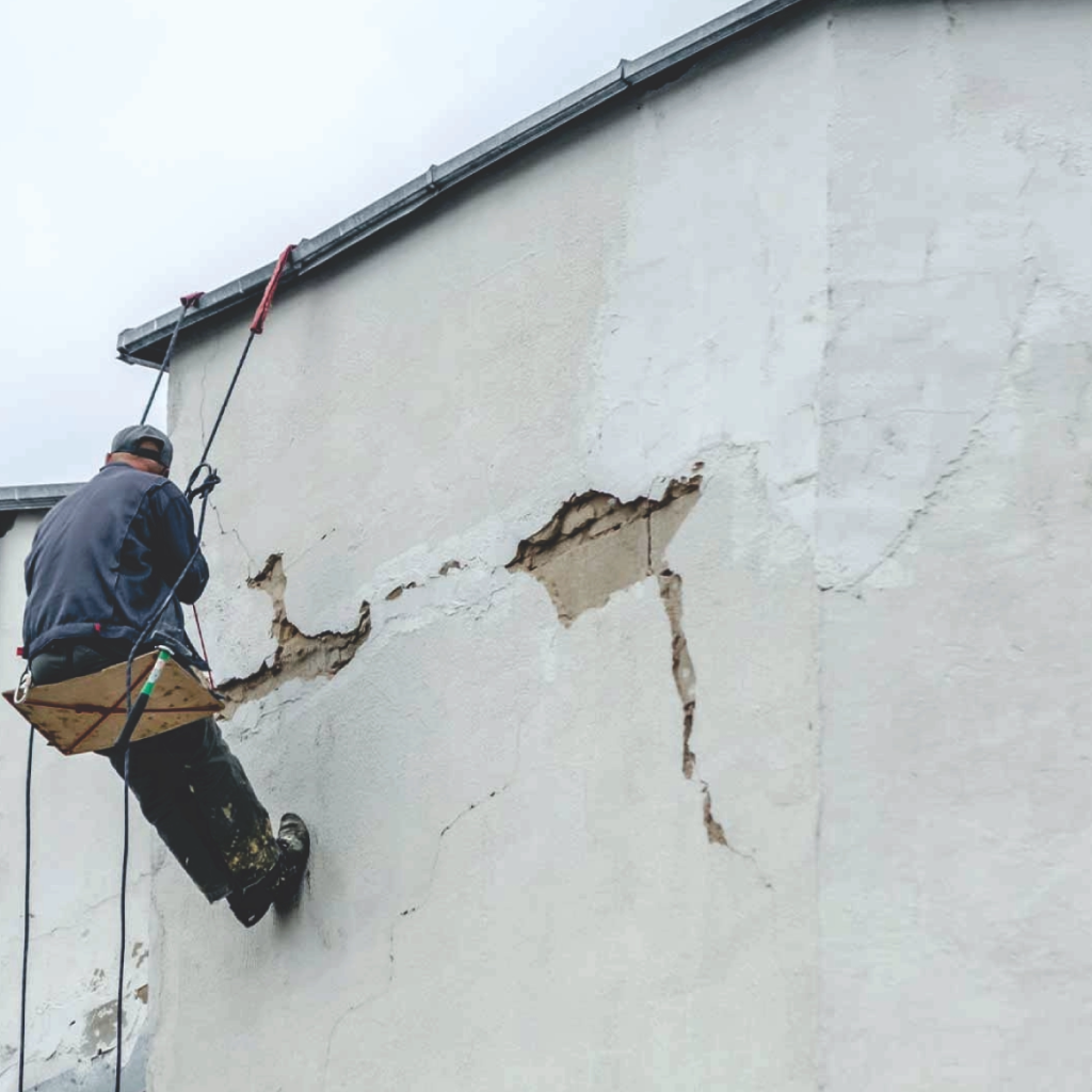 Damp Wall Causes from exterior wall cracks allowing rainwater seepage