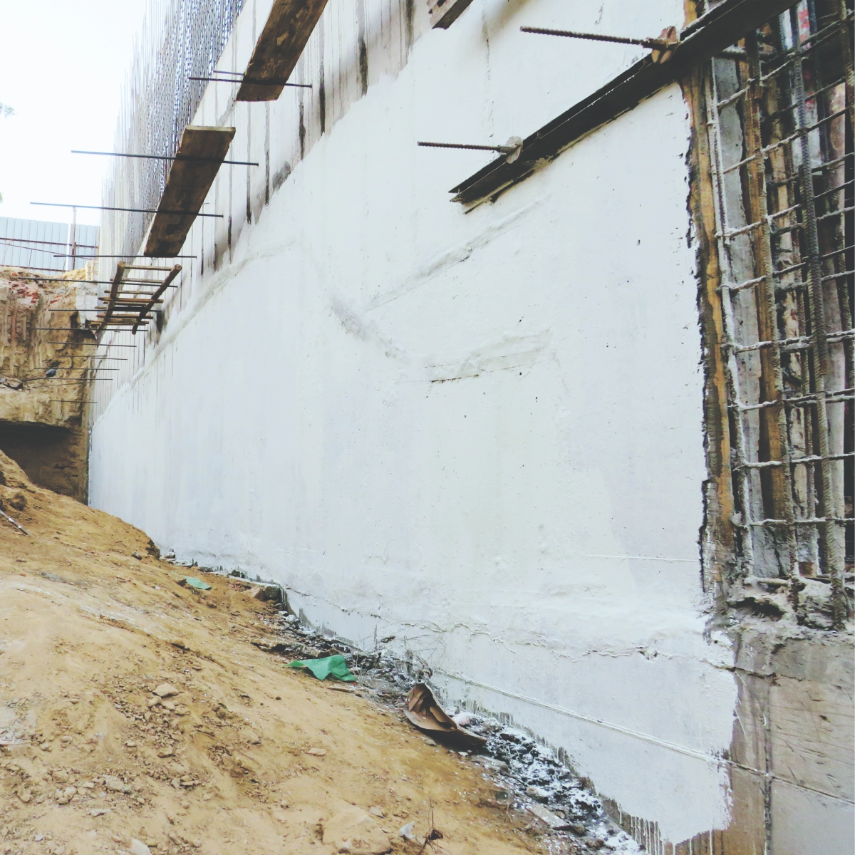 PSV Premix waterproofing applied on wall surface to stop dampness and leakage