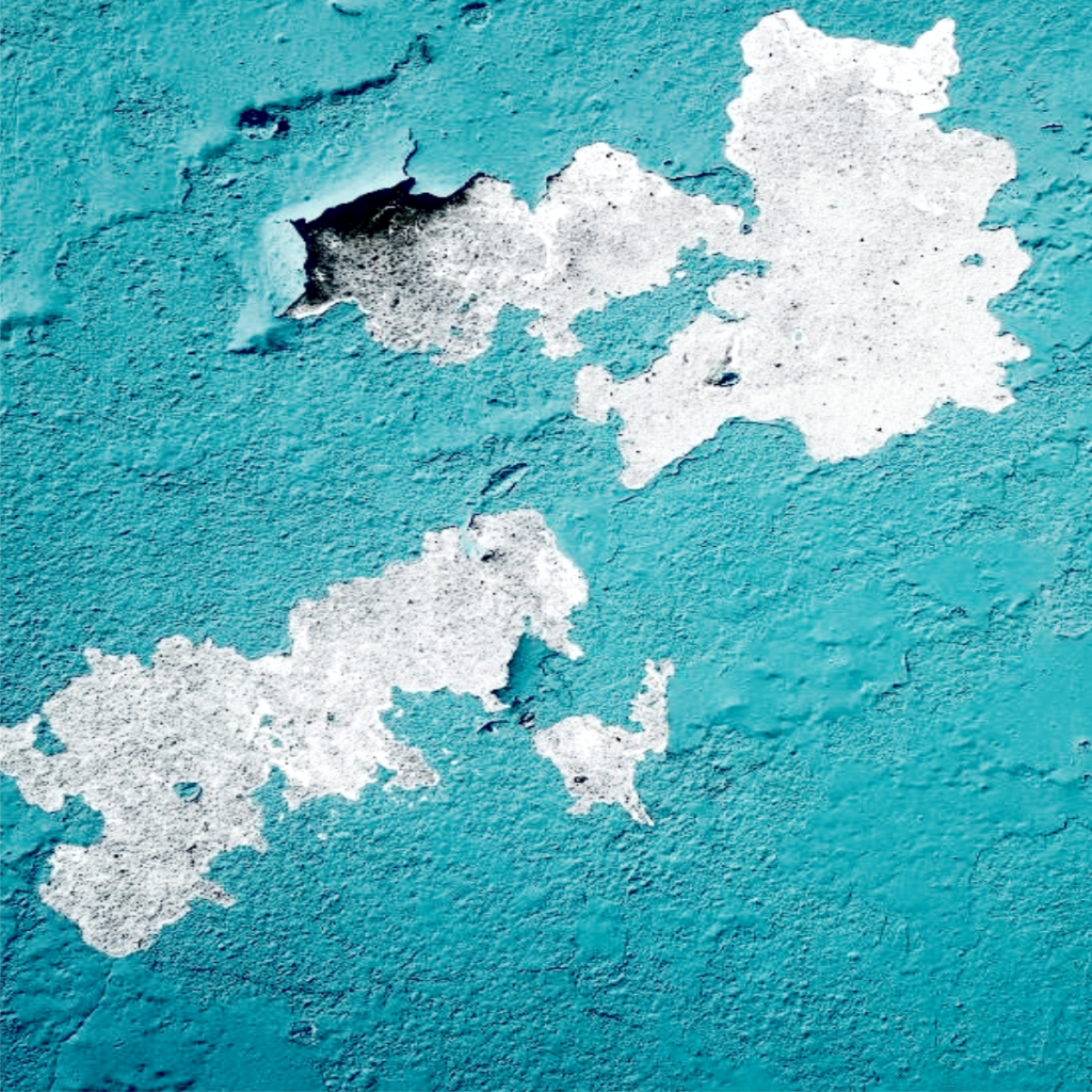 Damp Wall Causes showing interior wall paint peeling and damp patches due to moisture