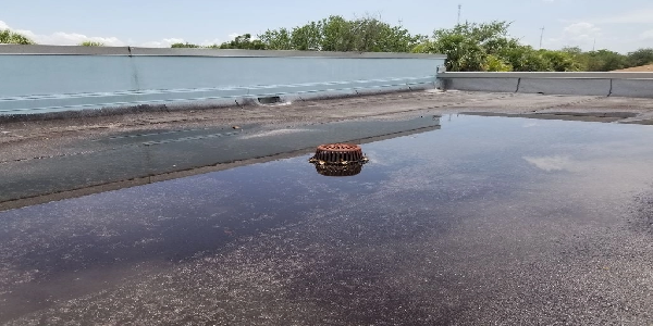 standing water on terrace due to improper slope leading to leakage