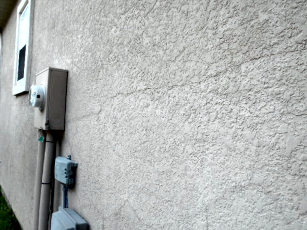 Damp Wall Causes exterior wall seepage cracks